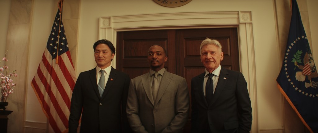 Captain America/Sam Wilson (Anthony Mackie, center) and President Thaddeus Ross (Harrison Ford, right) in Marvel Studios' CAPTAIN AMERICA: BRAVE NEW WORLD, exclusively on Disney+. Photo courtesy of Marvel Studios. © 2024 MARVEL.