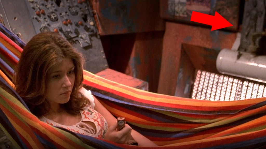 Screengrab of Firefly episode "The Message" with an arrow pointed at a figurine of Han Solo in carbonite