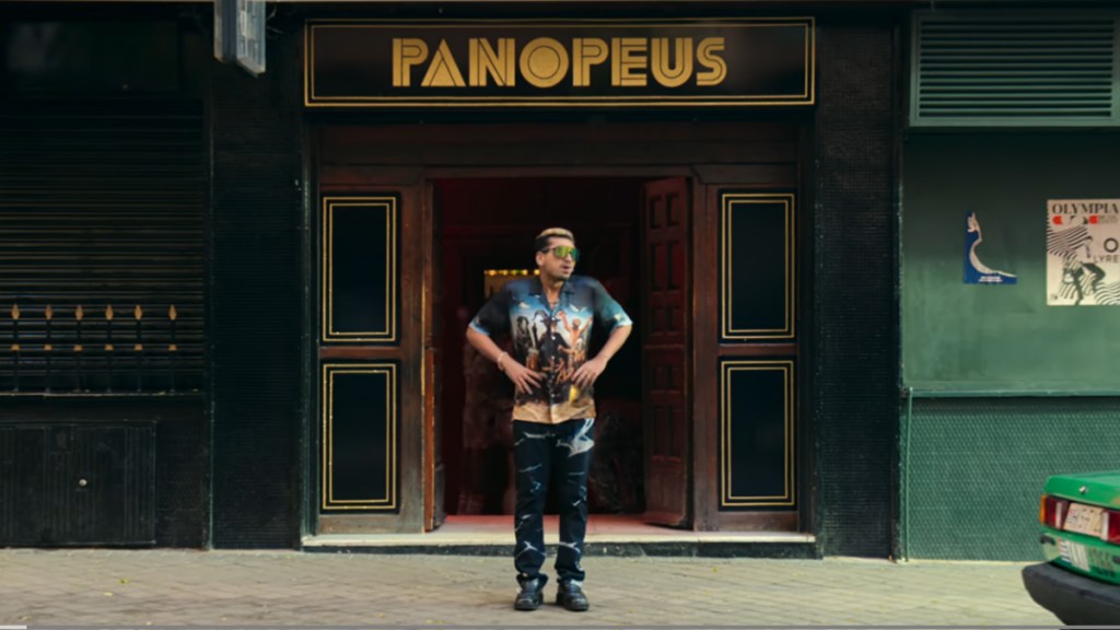 Dionysus in Kaos standing outside the Panopeus nightclub