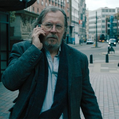 Gary Oldman as Jackson Lamb in Slow Horses season 4 episode 3 on a London street talking on a mobile phone