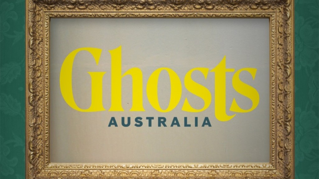 Ghosts Australia logo in a gold picture frame hanging on a green wallpapered wall