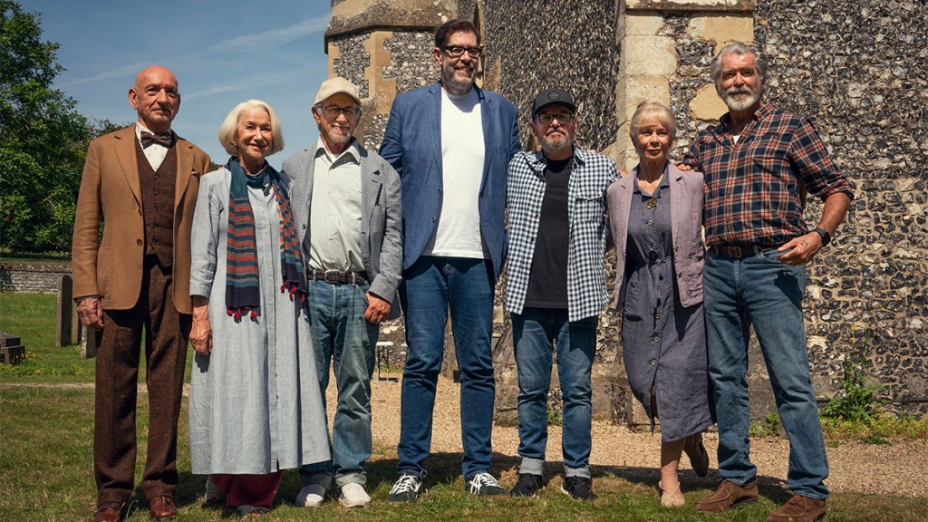 Cast of The Thursday Murder Club film with Richard Osman, Steven Spielberg and Chris Columbus. Credit: NETFLIX