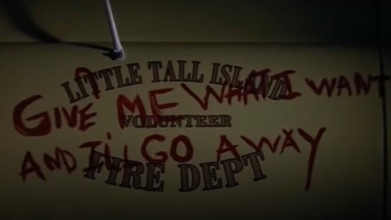 Graffiti reading "Give Me What I Want And I'll Go Away" in Stephen King's Storm of the Century.