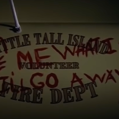 Graffiti reading "Give Me What I Want And I'll Go Away" in Stephen King's Storm of the Century.