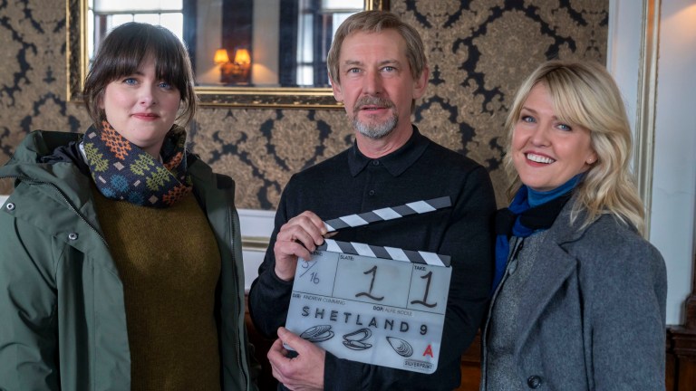 Alison O'Donnell, Ian Hart and Ashley Jensen holding a clapperboard for Shetland Series 9