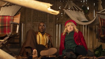 The Doctor and Joy sitting on the floor looking scared in Doctor Who Christmas special Joy to the World