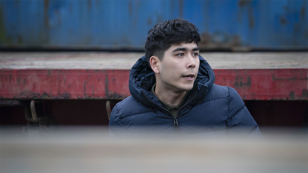 Nathan in Shetland season 9 wearing a blue hooded jacket