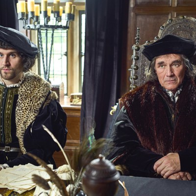 Risley and Cromwell sitting at a desk in Wolf Hall: The Mirror and the Light