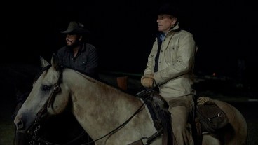 John Dutton (Kevin Costner) on a horse at night in Yellowstone season 5.