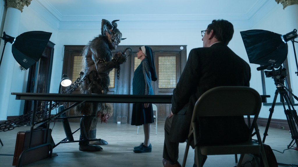 L-R Fedor Steer as Demon Stick, Andrea Martin as Sister Andrea and Michael Emerson as Leland Townsend In Evil episode 14, season 4, Streaming on Paramount+ 2024. Photo Credit: Elizabeth Fisher/Paramount+