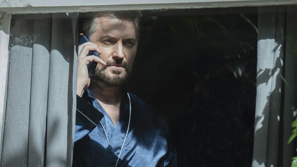 Richard Armitage looking out of a window in Harlan Coben&rsquo;s Missing You on Netflix