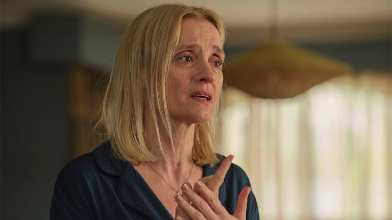 Anne-Marie Duff looking upset with her hands by her chest in BBC thriller Reunion