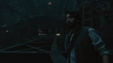 Lukas Kyle (Avi Nash) in the bowels of mechanical in Apple TV+'s Silo.