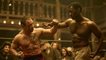 Two men fighting topless in a 19th century boxing ring