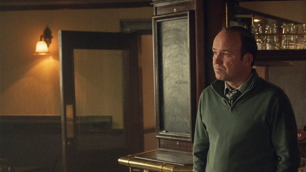 Rory Kinnear wearing a green jumper in a pub in Netflix&rsquo;s Toxic Town