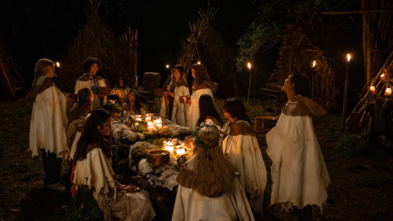 Jenna Burgess as Teen Melissa, Liv Hewson as Teen Van, Jasmin Savoy Brown as Teen Taissa, Nia Sondaya as Teen Akilah, Courtney Eaton as Teen Lottie, Anisa Harris as Teen Robin, Vanessa Prasad as Teen Gen, Sophie Thatcher as Teen Natalie, Sophie Nélisse as Teen Shauna, Alexa Barajas as Teen Mari, Samantha Hanratty as Teen Misty, Kevin Alves as Teen Travis and Silvana Estifanos as Teen Britt in Yellowjackets, episode 1, season 3, streaming on Paramount+ with SHOWTIME