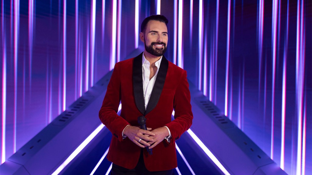 Rylan Clark in a red velvet jacket on Doctor Who