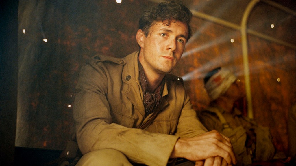 Jonah Hauer-King in military fatigues in World on Fire