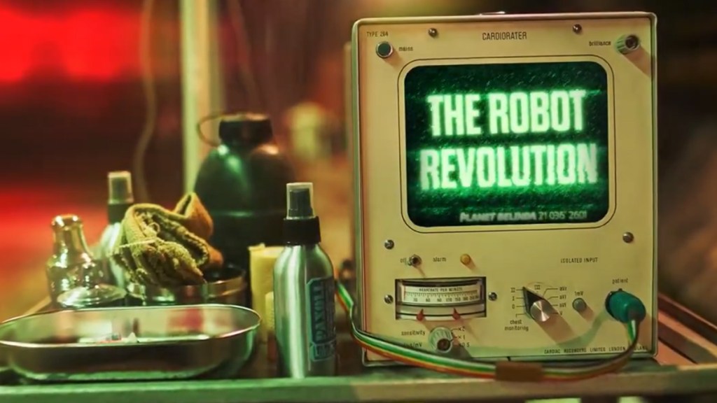 Screengrab of motion title card for Doctor Who episode &ldquo;The Robot Revolution&rdquo; featuring an old-fashioned digital medical device.