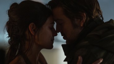 Bix (Adria Arjona) and Cassian (Diego Luna) touch foreheads lovingly in Andor season 2