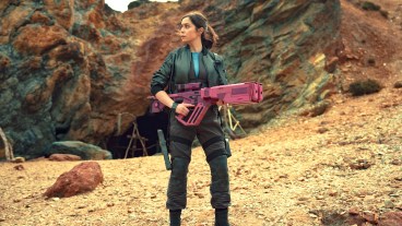 Nanette Cole (Cristin Milioti) hold a pink rifle on an alien world in Black Mirror "USS Callister: Into Infinity."