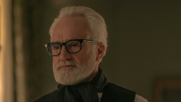 Bradley Whitford with a white beard and black framed glasses in The Handmaid's Tale season 6 episode 9 "Execution"