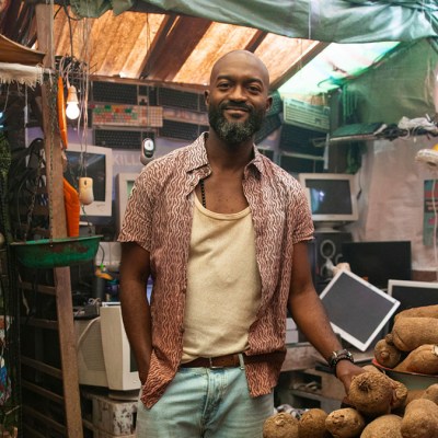 Inua Ellams in a Nigerian-styled street market for Doctor Who series 15