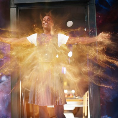 Ncuti Gatwa as the Fifteenth Doctor standing in the TARDIS doorway emitting regeneration energy