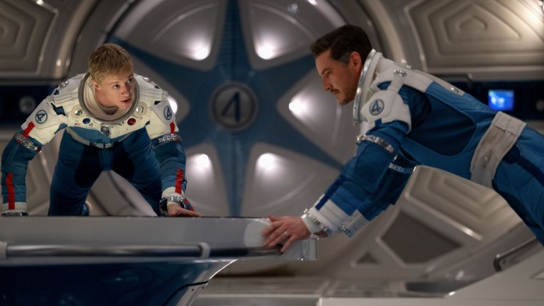 (L-R) Joseph Quinn as Johnny Storm/Human Torch and Pedro Pascal as Reed Richards/Mister Fantasticin 20th Century Studios/Marvel Studios' THE FANTASTIC FOUR: FIRST STEPS. Photo courtesy of 20th Century Studios/Marvel Studios. © 2025 20th Century Studios / © and ™ 2025 MARVEL.