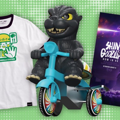 A Kaiju team shirt, Godzilla on a tricycle, and Shin Godzilla poster