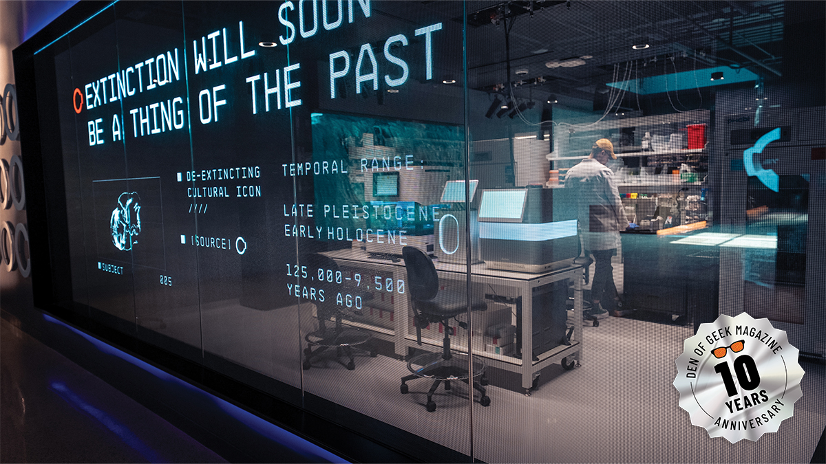 Modern lab with screens displaying extinct species revival research
