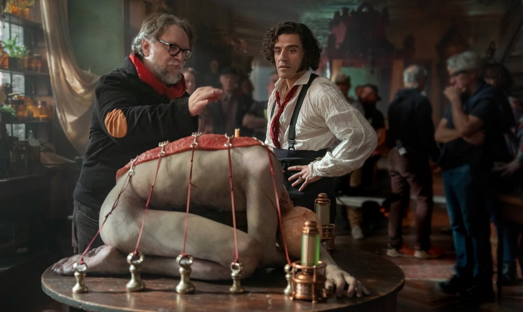 Guillermo del Toro and Oscar Isaac on Frankenstein set