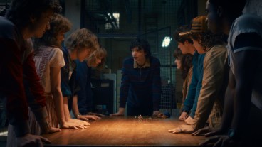 STRANGER THINGS: SEASON 5. (L to R) Joe Keery as Steve Harrington, Natalia Dyer as Nancy Wheeler, Charlie Heaton as Jonathan Byers, Maya Hawke as Robin Buckley, Finn Wolfhard as Mike Wheeler, Winona Ryder as Joyce Byers, Noah Schnapp as Will Byers, Gaten Matarazzo as Dustin Henderson, and Caleb McLaughlin as Lucas Sinclair in Stranger Things: Season 5. Cr. COURTESY OF NETFLIX © 2025