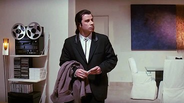 John Travolta in Pulp Fiction looking around