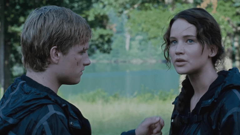 Peeta (Josh Hutcherson) and Katniss (Jennifer Lawrence) at the end of The Hunger Games.