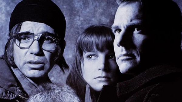 The cast together, reflecting the tension and drama that drives the story.