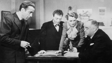 Scene from Maltese Falcon. Motion pictured released in 1941. | Version of: 'The Maltese Falcon' by Dashiell Hammett.