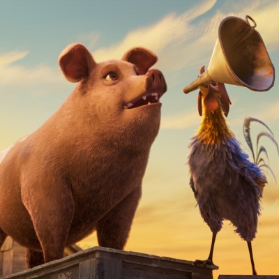 Napoleon speaking into a microphone in Animal Farm