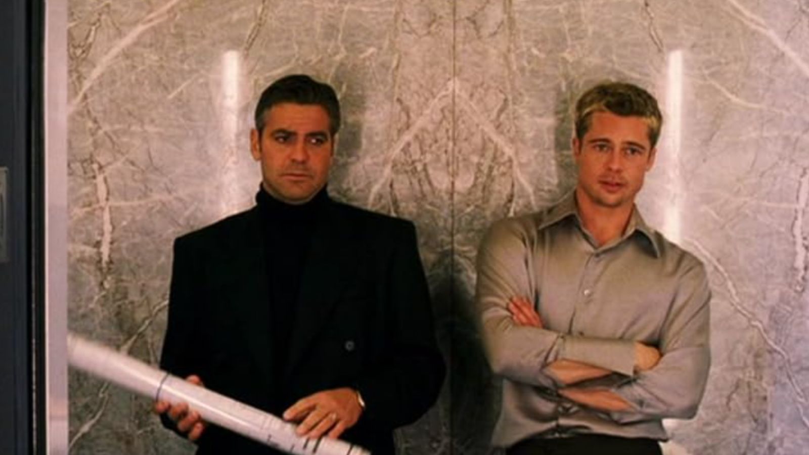 A collage of iconic heist movie scenes