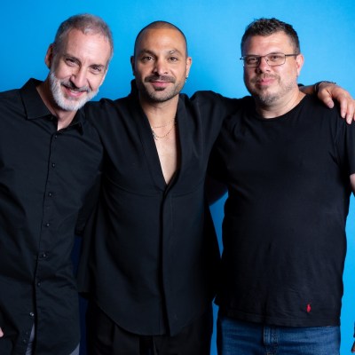 Jim Krieg, Michael Mando, Rick Morales of Batman: Knightfall in Den of Geek studio at SDCC 2026.