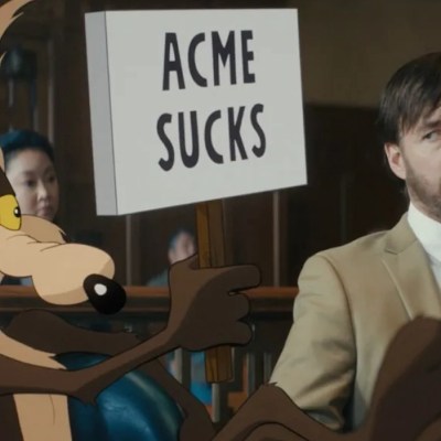 Coyote vs Acme sucks sign