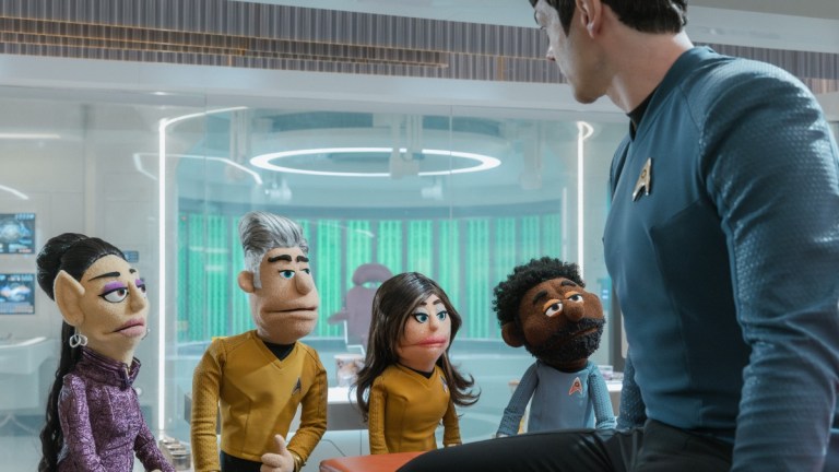 (L-R): Gia Sandhu as T'Pring, Anson Mount as Captain Pike, Rebecca Romijn as Una, Babs Olusanmokun as Dr. M’Benga, and Ethan Peck as Spock in season 4, episode 5, of Star Trek: Strange New Worlds streaming on Paramount+, 2026. Photo Credit: Jan Thijs/Paramount+